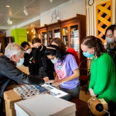 Graduate students in the Inside the Archive course use a backlight to examine images from the Louis Kahn Collection at a visit to the Architectural Archives on March 22. During a visit, students learned about how the collection came to Penn, as well as how it’s managed and maintained.